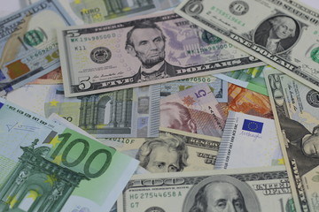 various currencies from countries spanning the World . financial crisis 2020