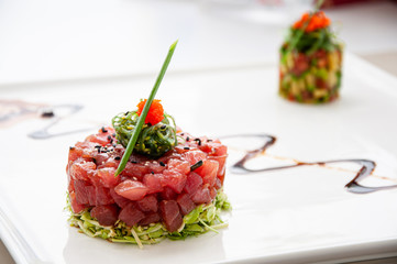 Fresh Tuna tartare sesame seaweed and green salad and balsamic reduction sauce and salsa - 329716262