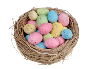 Easter handmade  nest from willow twigs with  clay birds eggs isolated