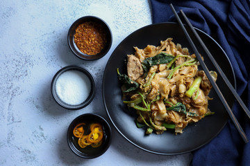 Thai food - Stir fried rice noodle with soy sauce. It’s called “Pad See Ew” in Thai language.