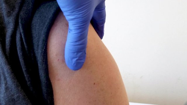 Vaccine shot in the arm 3x loop