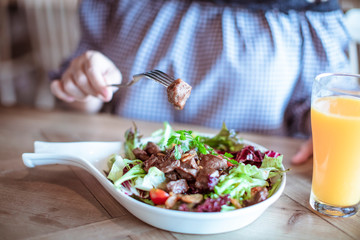 Tasty salad with grilled beef steak