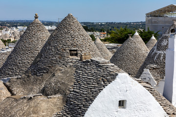 Stone roofs of Trulli Houses in Alberobello; Italy. The style of construction is specific to the...