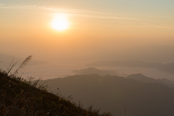 The scenery of Phu Chi Fah with sea of fog at sunrise time in Chiang Rai, Thailand.