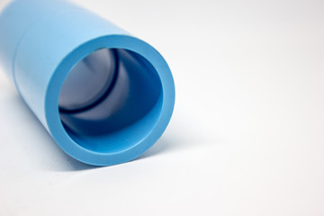 Blue plastic PVC joints on a white background Business