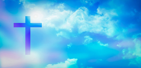 Christian cross appeared bright in the sky with soft fluffy clouds, white, beautiful colors. With the light shining as hope, love and freedom in the sky background