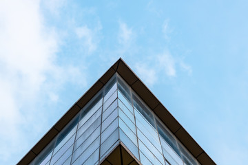 Fototapeta na wymiar Bottom UP View Of A Corporate Building Against The Blue Sky