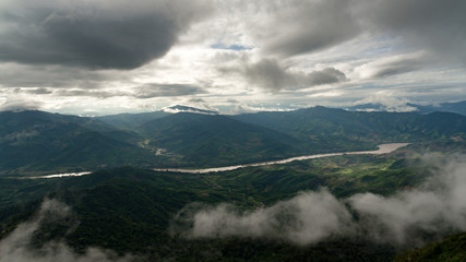 Beautiful view of Khong river and mountain layers from Pha Tang view point in Chiang Rai, Thailand.