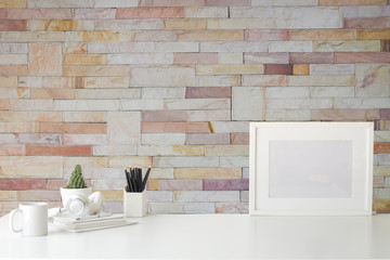 Mockup workspace desk and copy space books,plant and coffee on white desk.