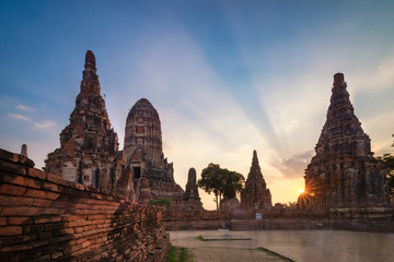 Fototapeta premium Long exposure of Chaiwattanaram temple with twilight sky in sunset time in Ayuttaya, Thailand.