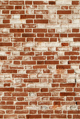  Red old vintage urban brick wall. Retro wallpaper. Red - brown textured brick wall with an old layer of stucco.