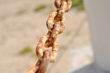 Vintage chain, old rusty steel close up