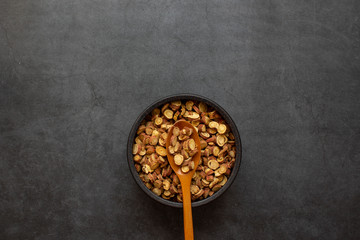 Sliced licorice root on dark gray background