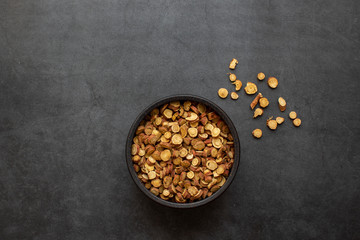 Sliced licorice root on dark gray background