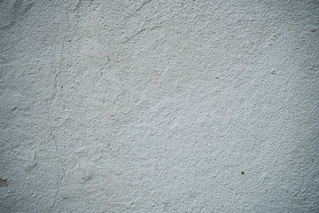 Texture of an old wall covered with paint. Background image of a worn paint coated surface