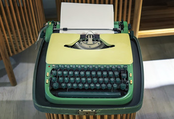 Old typewriter with a sheet of paper in a vintage store
