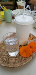 Closeup of pure water and cold milk blurred background.  Drinks for health concept.