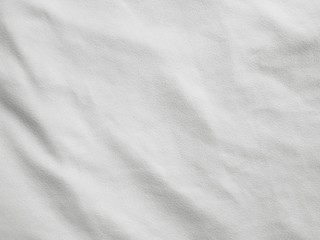 Soft white wrinkled fabric background