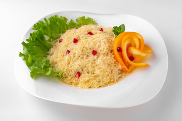 Tuna mimosa salad with vegetables, cheese. Banquet festive dishes. Gourmet restaurant menu. White background.