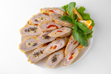 Sliced meatloaf with sauces. Banquet festive dishes. Gourmet restaurant menu. White background.