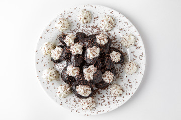 Dessert prunes stuffed with nuts and cream. Banquet festive dishes. Gourmet restaurant menu. White...