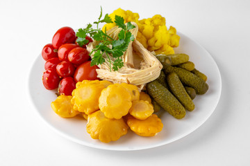 Delicious pickles: cucumbers, squash, tomatoes. Banquet festive dishes. Gourmet restaurant menu....