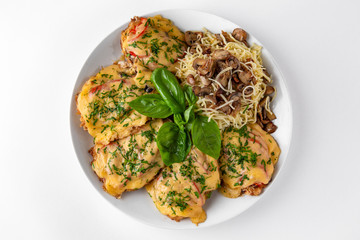 Meat chop with vegetables in egg batter with flour and noodles and mushrooms. Banquet festive...