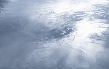 Shiny blue ice surface, background texture