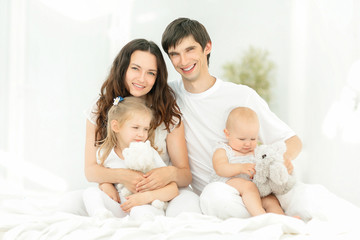 Fototapeta na wymiar background image of a young happy family.