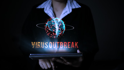 Business woman using a tablet computer, with virus outbreak words hologram futuristic globe sphere, technology concept