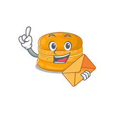 Cute face orange macaron mascot design with envelope