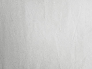 Soft white wrinkled fabric background