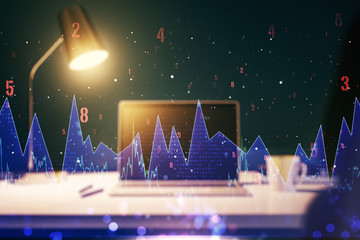 Multi exposure of creative statistics data hologram on laptop background, stats and analytics concept