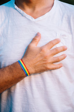 Man hand with gay flag bracelet