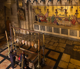 JERUSALEM, ISRAEL - January 29, 2020: Church of the Holy Sepulchre, The Stone of Anointing, where...