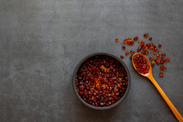 chinese dessert tong sui(Sweet Soup)ingredients ;Chinese cuisine, dried peach gum on dark gray background, health food