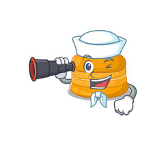 Orange macaron in Sailor cartoon character design with binocular