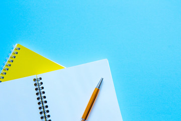 Set of stationery on blue background. Flat lay