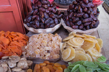 Dried fruit lying on a market stall for sale in the old part of Jerusalem
