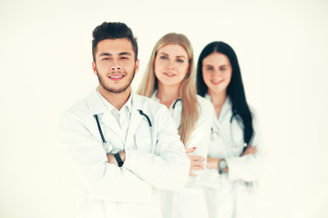 group of smiling hospital colleagues standing together