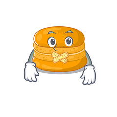 Orange macaron mascot cartoon character design with silent gesture