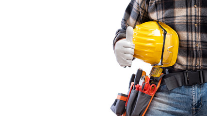 Electrician makes OK sign with thumb up, he wears protective gloves. Construction industry,...