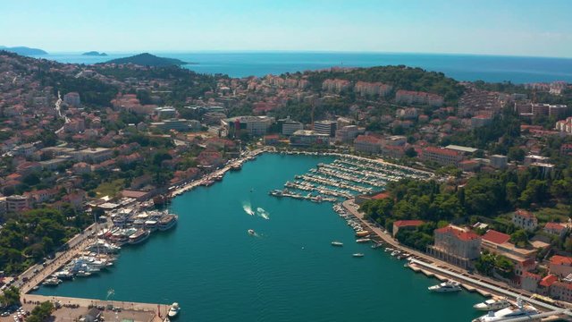 Aerial shot flying over dubrovniks main sailing route towards it's famous port