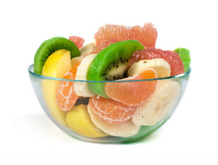 Fruit salad with citrus in a glass bowl