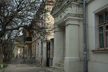 entrance to an old house with square columns