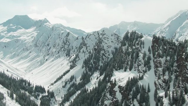 aerial landscape of a beautiful mountain ridge in the alps on an overcast day