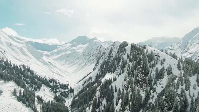 aerial drone shot revealing a beautiful mountain ridge in the alps of austria