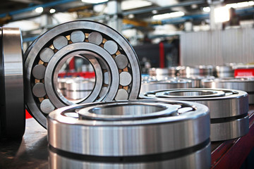 Finished products made of closed and open type bearings. The concept of industry. General view of a...