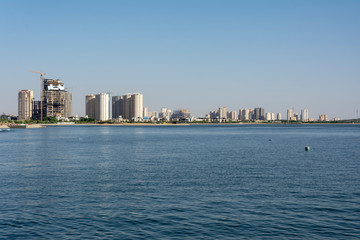 city view behind the lake