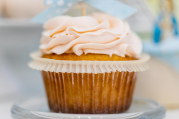 Tasty candy bar for Birthday party on table against color background